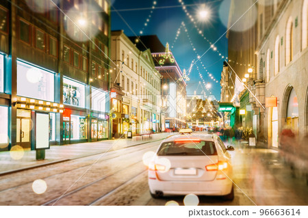 Helsinki, Finland. Taxi Car Parking On Aleksanterinkatu Street. Effect Bokeh Xmas Christmas Lights Decorations And Festive Illumination. Winter Christmas Xmas Holiday Season. Boke View Helsinki, Finland. Taxi Car Parking On Aleksanterinkatu Street. Effect Bokeh Xmas Christmas Lights Decorations And Festive Illumination. Winter Christmas Xmas Holiday Season. Boke View 96663614