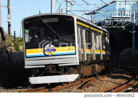 Series 205 1100s on the Tsurumi Line going through the Keihin Industrial Area (Tsurumi Station's 150th anniversary headmark posted) 96663952