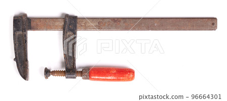 Big old metal clamp or Joiner clamp wood tools, isolated Big old metal clamp or Joiner clamp wood tools, isolated 96664301