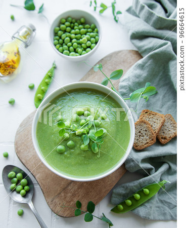 Fresh vegetable soup made of green peas Fresh vegetable soup made of green peas 96664615