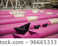 black paper ships sail through pink iron pipes. imitation 96665333