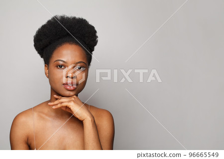Attractive female model woman on white studio wall background Attractive female model woman on white studio wall background 96665549