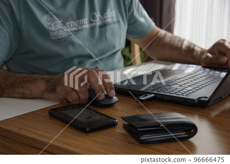 Man working remotely from home  96666475