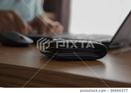 Man working remotely from home  96666477