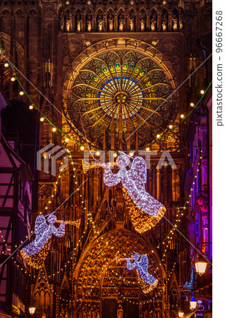 STRASBOURG, FRANCE - December 2016 - angel decoration in front of Cathedral Notre Dame STRASBOURG, FRANCE - December 2016 - angel decoration in front of Cathedral Notre Dame 96667268