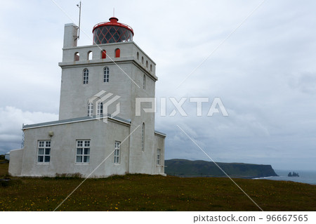 Dyrholaey lighthouse view. South Iceland landmark. 96667565