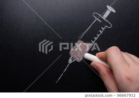 Hand drawing syringe icon with white chalk on blackboard Hand drawing syringe icon with white chalk on blackboard 96667932