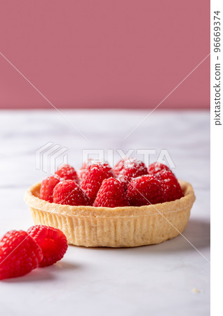 Tart with fresh raspberries Tart with fresh raspberries 96669374