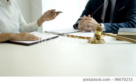 Lawyers are listening to reports from associates Lawyers are listening to reports from associates 96670233
