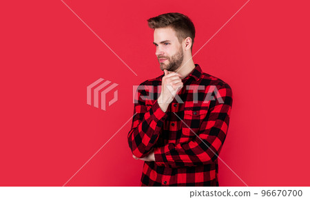 Cowboy style. cheerful and stylish. handsome man on red background. indoor portrait of sexy european businessman. confident and calm. handsome casual man standing with beard and bristle. copy space 96670700