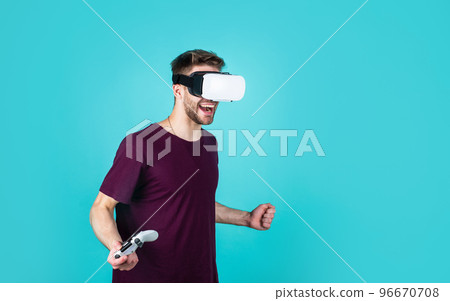 young guy with unshaven face and stylish hair wear wireless vr headset, digital life 96670708
