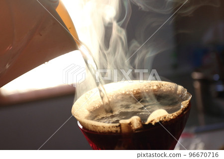 morning drip coffee sunrise and steam 96670716