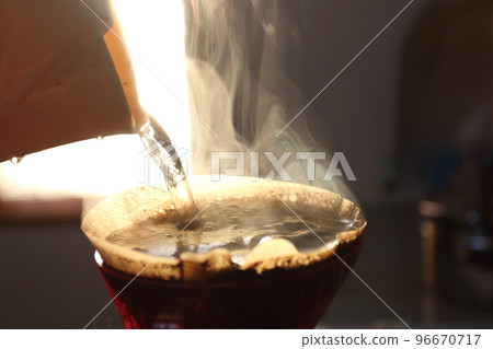 morning drip coffee sunrise and steam 96670717