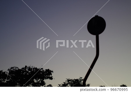 The silhouette of the sign standing at the entrance at night The silhouette of the sign standing at the entrance at night 96670995
