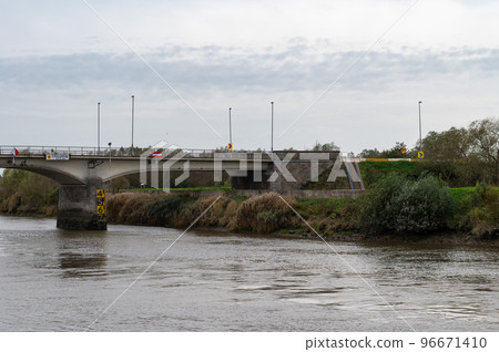 Berlare, East Flemish Region, Belgium - Bridge over the River Scheldt with green surroundings 96671410