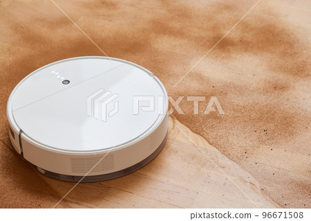Robot vacuum cleaner cleans the very dirty dusty floor of the apartment at a certain time. Robot vacuum cleaner cleans the very dirty dusty floor of the apartment at a certain time. 96671508