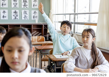 Elementary school students taking classes 96672629