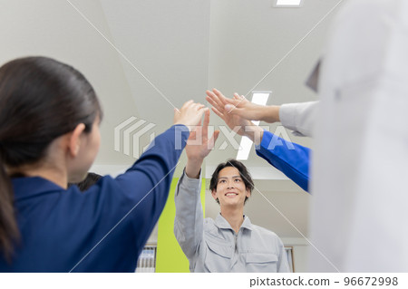Worker giving a high five 96672998