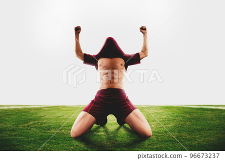 Successful soccer player wins the football match Successful soccer player wins the football match 96673237