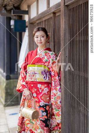 A woman in kimono shape A woman in kimono shape 96673928