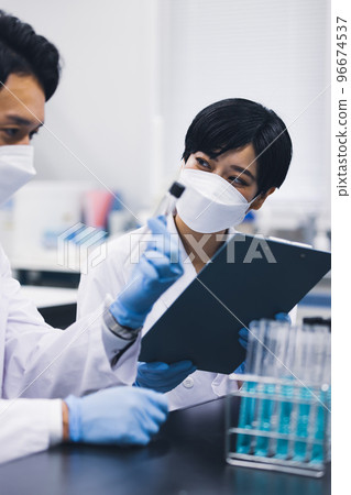 young researcher doing research 96674537