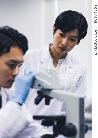 young researcher doing research 96674558