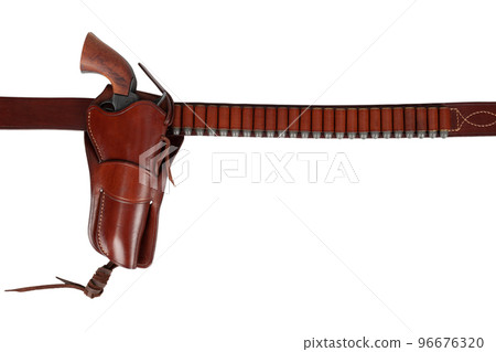 Old west weapon. Leather gun belt with ammnunitions and revolver in holster 96676320