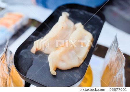 Dumplings cooked at the campsite 96677001