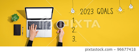 2023 goals with person using laptop computer 2023 goals with person using laptop computer 96677418