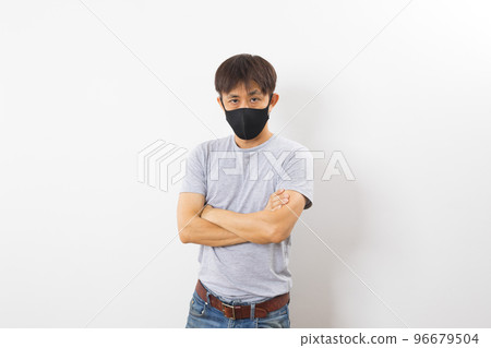 Asian man wearing Face Mask protect spread Covid-19 Coronavirus on white background Asian man wearing Face Mask protect spread Covid-19 Coronavirus on white background 96679504