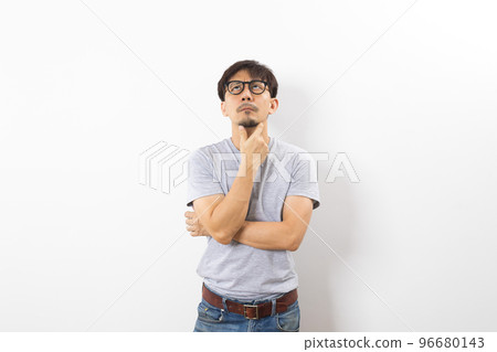 Asian handsome man with grey shirt and eyeglasses with curious and confuse expression isolated on white background and clipping paths. Asian handsome man with grey shirt and eyeglasses with curious and confuse expression isolated on white background and clipping paths. 96680143