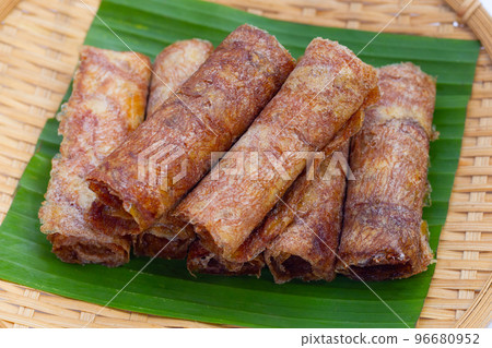Sun dried banana roll snacks 96680952