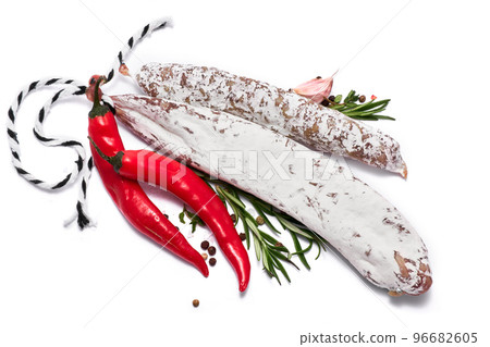 Spanish Fuet thin dried salami sausage isolated on a white background Spanish Fuet thin dried salami sausage isolated on a white background 96682605