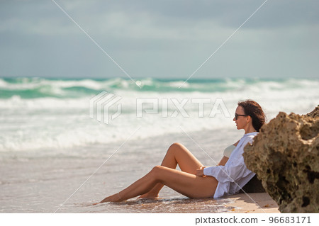 Young beautiful woman relax on the beach 96683171