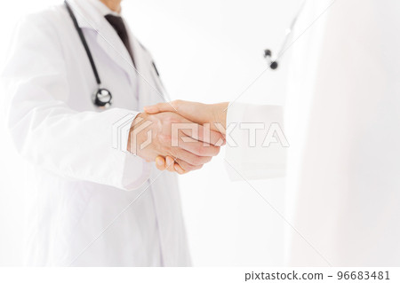 people in white coats shaking hands people in white coats shaking hands 96683481