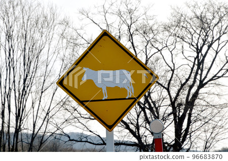 Peeled-off cow caution sign 96683870