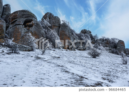 Mount Alenga near Southern Demerdzhi in snow and ice in spring. Crimea 96684465