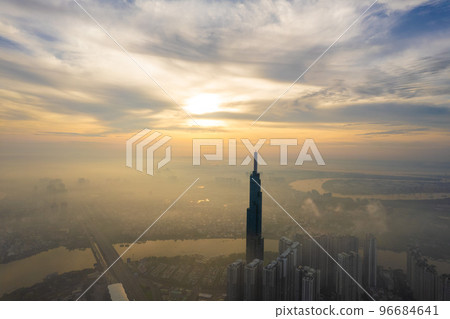 aerial view of Ho Chi Minh City in the morning, Top view aerial photo from flying drone of a Ho Chi Minh City with development buildings, transportation, energy power infrastructure. 96684641