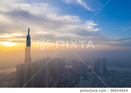 aerial view of Ho Chi Minh City in the morning, Top view aerial photo from flying drone of a Ho Chi Minh City with development buildings, transportation, energy power infrastructure. 96684664