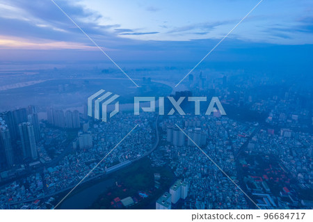 aerial view of Ho Chi Minh City in the morning, Top view aerial photo from flying drone of a Ho Chi Minh City with development buildings, transportation, energy power infrastructure. 96684717