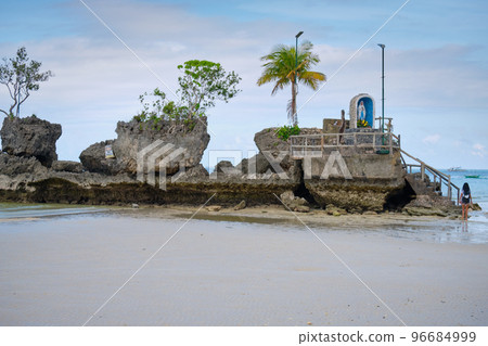 Boracay, Philippines - Jan 27, 2020: famous landmark of Boracay island. A small rock in the sea. Catholic Church in a rock in the sea. Boracay, Philippines - Jan 27, 2020: famous landmark of Boracay island. A small rock in the sea. Catholic Church in a rock in the sea. 96684999