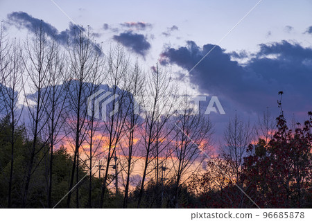 Nara City Sunset sky that changes color from golden to reddish purple every second Nara City Sunset sky that changes color from golden to reddish purple every second 96685878