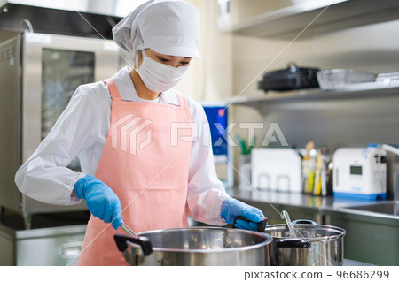 young female cook young female cook 96686299