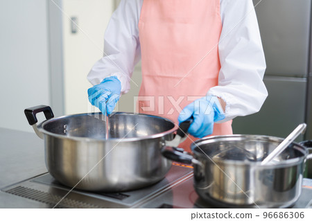 young female cook 96686306