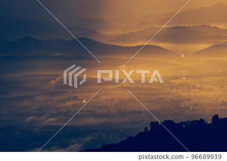 Beautiful mountain and morning sunrise over the sea of mist. Mon Sone View point , Doi Pha Hom Pok National Park in Chiang Mai,Thailand. Beautiful mountain and morning sunrise over the sea of mist. Mon Sone View point , Doi Pha Hom Pok National Park in Chiang Mai,Thailand. 96689939
