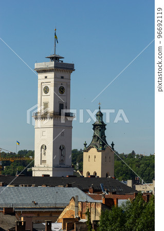 The historic city center of Lviv, old houses in the old town, Tower of City Hall on the Market Square. Lvov, Ukraine 96692119