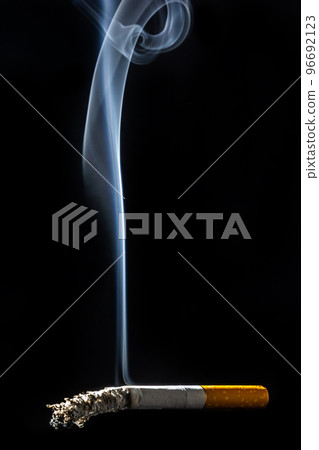Cigarette smoking closeup isolated on balck background. No smoking concept 96692123