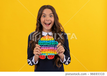 push button antistress silicone toy. sensory fidgeting. girl with finger game. 96693310