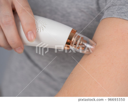 Close-up of a vacuum skin cleaner at home. Close-up of a vacuum skin cleaner at home. 96693350