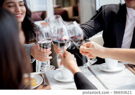 Happiness team young business people in party celebrate success holding glass of wine cheer. 96693621